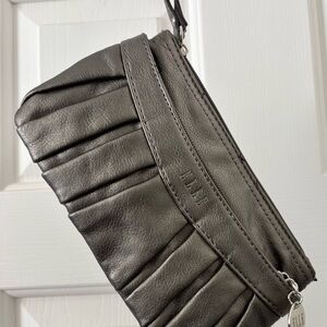 Elegant Bronze in color Leather Clutch